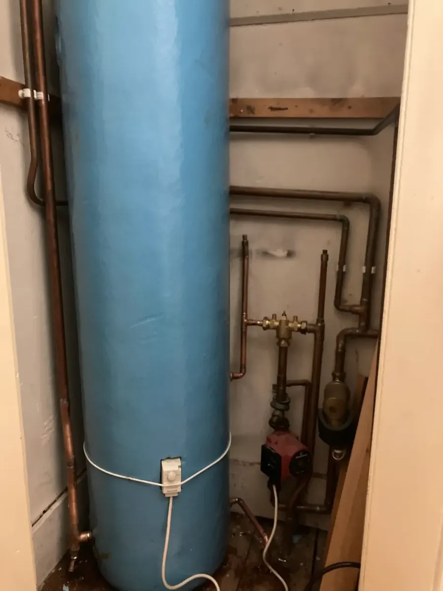 Hot water cylinder and copper pipework in Ferring